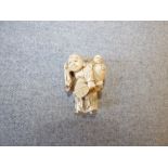 Chinese carved ivory figure of man carrying child PLEASE always check condition PRIOR to bidding, or