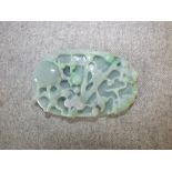 Pale jade carved oval pendant with monkeys in a tree, the base with foliage 18cm L PLEASE always