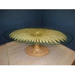 Contemporary designer carved wood pedestal dining table in the form of a palm leaf pedestal