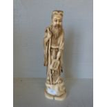 C19th Japanese ivory figure of an Elder holding a fan, signed, 31H cm PLEASE always check