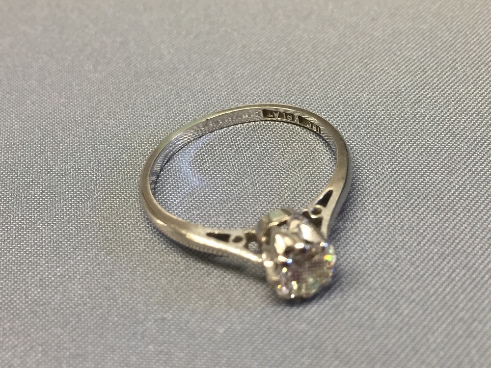 Diamond single stone ring, stamped 'Plat', the brilliant cut calculated as weighing approx. 0.46