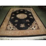 Large Chinese Superwash rug with dragons & floral sprays on a black ground 260 x 360 cm PLEASE