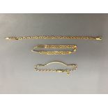 9ct gold identity bracelet, a 9ct gold bracelet of fancy links & a 9ct gold bracelet of Greek key