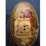 Continental pottery timepiece with brass movement, within a brass easel back 'C' scroll frame PLEASE