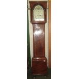 George III mahogany longcase clock, the arched hood flanked by fluted pilasters over a trunk door,