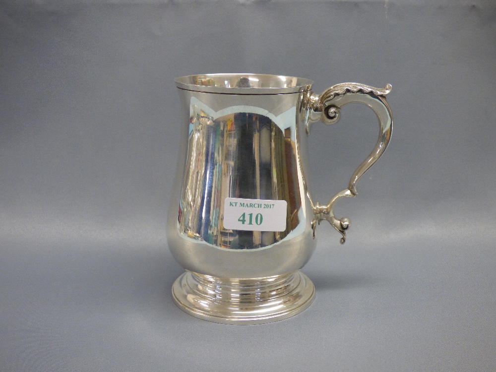 Georgian style hallmarked silver baluster pint mug with castor leaf cap scroll handle, by Jay and