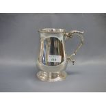 Georgian style hallmarked silver baluster pint mug with castor leaf cap scroll handle, by Jay and