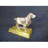 Mid C20th silver model of a cocker spaniel on soapstone plinth base, 9cm high PLEASE always check