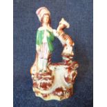 Late C18th/early C19th Staffordshire figure modelled with a gentleman alongside a goat and