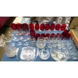 A qty of assorted clear and cut glass tablewares to include 3 cut glass decanters and stoppers,