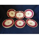 A Copeland 13 piece part dinner service, decorated in maroon & gilt, retailed by 'Higginbottom,