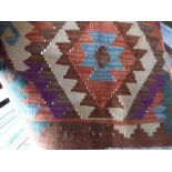 Kunduz Kilim pastel colours on a dark oatmeal background 184x60 cm