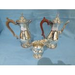 Silver coffee pot, hot water jug and cream jug, 'Goldsmiths and Silversmiths Co. Ltd.' London