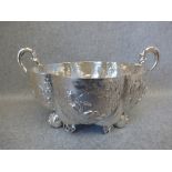 Hallmarked silver bowl with embossed scenes & serpent handles by 'BM' with Chester import mark