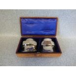 Pair of silver plated boot slips in a fitted leather case PLEASE ALWAYS CHECK CONDITION PRIOR TO