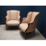 Pair of decorative French style armchairs upholstered in light coloured fabric