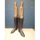 Pair of good quality black leather riding boots approx. size 6 or 7 (UK) & pair of wooden boot