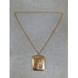 9ct gold compact pendant on 18ct gold chain, 50g