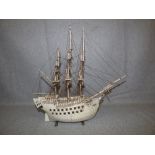 C19th Prisoner of War bone ship model of a Galleon with 3 masts, the model rigged with masts &