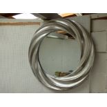 Large silver coloured circular moulded mirror with bevelled glass edge, 90 cm dia.