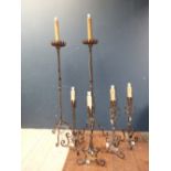 Pair of cast iron standard lamps & 2 pairs of cast iron table lamps