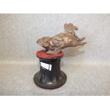 Chinese bronze figure of a dog faux on circular marble base 15H x 14W cm