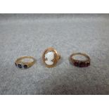 9ct gold, 3 stone garnet ring & 2 various yellow metal rings, 8.5g