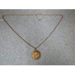 9ct gold chain necklace with 1967 full sovereign pendant set in mount, 22g