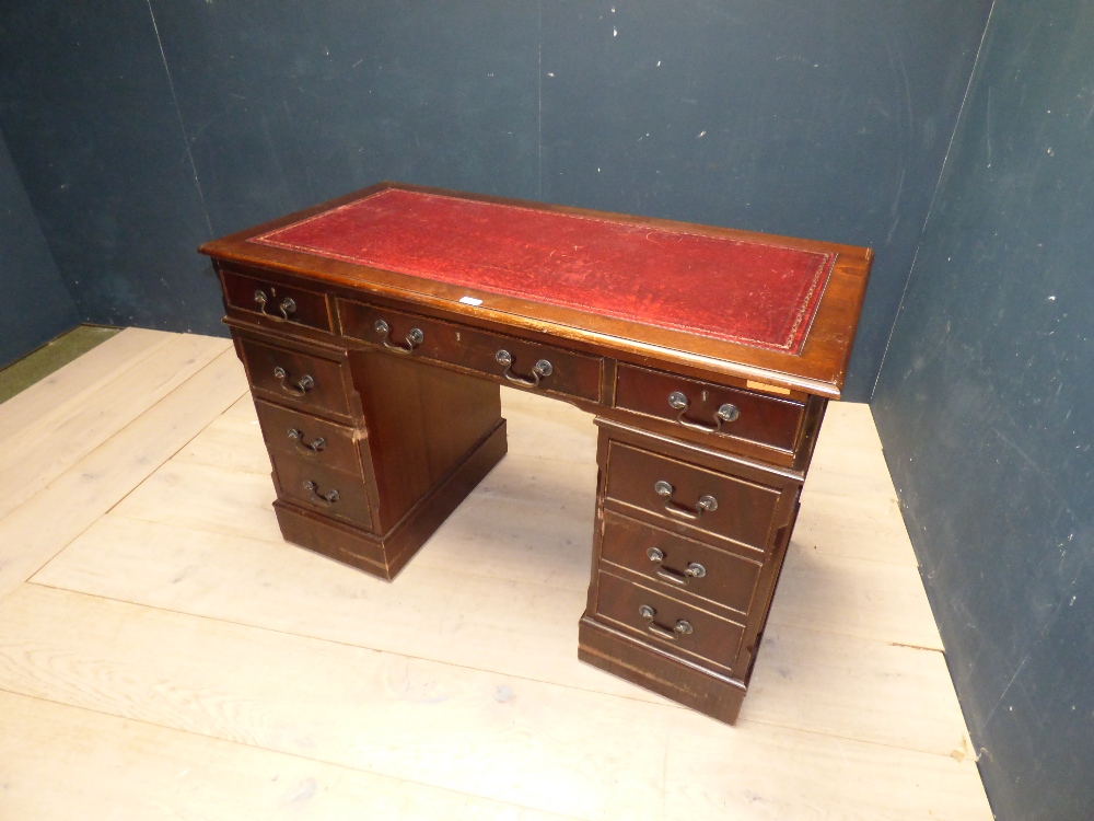 Mahogany pedestal desk with tooled leather top 120 cm W