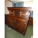 C18th oak court cupboard, the upper section with two central drawers flanked by small panelled