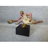 Cold painted car mascot figure of female tennis player, 10H x 15W cm (surface marks/scratches)