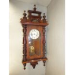 Edwardian mahogany cased wall clock 94 x 29 cm, bikes, clubs, raquets etc