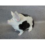 Black & white Wemyss pig, 9H x 17L cm (crack to 1 side and chipped on 1 ear)