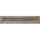 9 carat gold bracelet of alternating long oval and circular textured links, 18.5 cm long, 28.9g