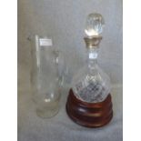 Hallmarked silver collar cut glass decanter on mahogany stand & Edwardian water jug