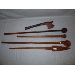 3 various tribal wooden clubs, 1 wooden spear & 1 wooden axe