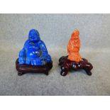 2 Chinese figures, Buddha, carved out of Lapis Lazuli & scholar out of coral, both on wooden stands
