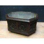 Large decorative carved wooden planter with lining
