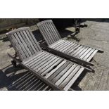 Pair of teak sunloungers