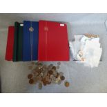 2 stock books & 2 albums with some stamps & a bag of pre-decimal coins