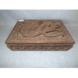 Carved wooden box with dragon decoration, makers label to base Ganemede wood carver and papier Mache