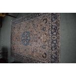Large Persian carpet, rust ground with stylised floral decoration