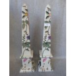 Pair Chinese obelisks, with floral and butterfly decoration
