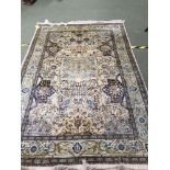Indian Kashmir hand made silk carpet with multi coloured floral decoration 268 x 180 cm (some