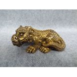 Chinese gilt bronze figure of a dog of fo 3 cm H x 7 cm W