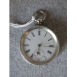Swiss silver open face pocket watch with gold hands