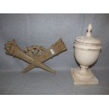 Decorative French painted wall piece of torchere & sheaf of arrows and a decorative urn