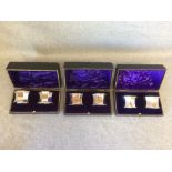 A set of 6 numbered octagonal silver napkin rings, cased in pairs by 'William Hutton & Sons'