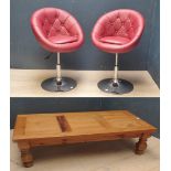 Pair of contemporary red leatherette bar stools & pine coffee table (general scratches/marks)