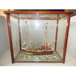 Glass cased model of a twin rigged Victorian French fishing boat, No. DI 1082 approx 47 cm L